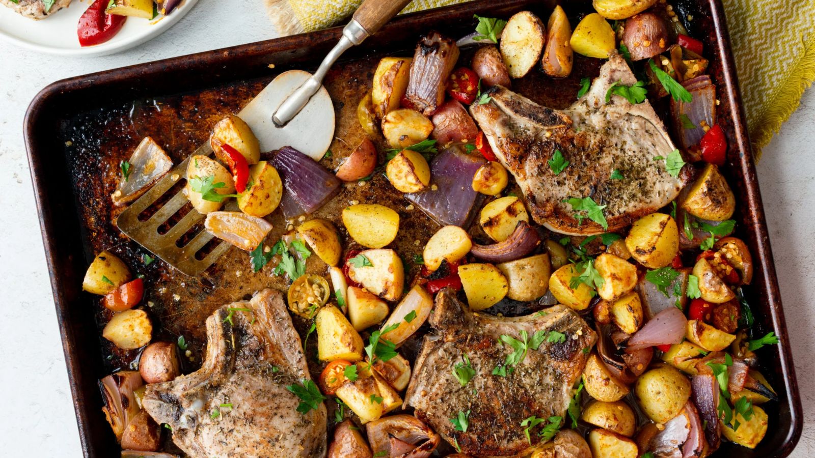 Pork Chops with Cherry Peppers, Onions, and Potatoes