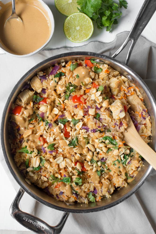 Thai Chicken Peanut Rice Skillet is an easy one pot meal that cooks in less than 30 minutes! It