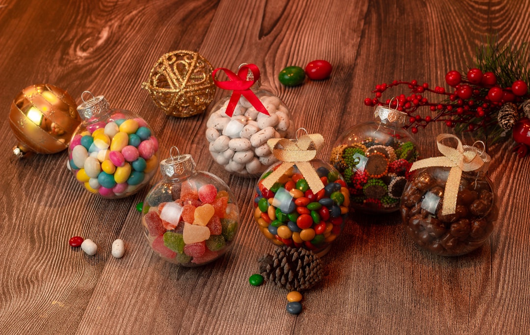 a wooden table topped with lots of candy
