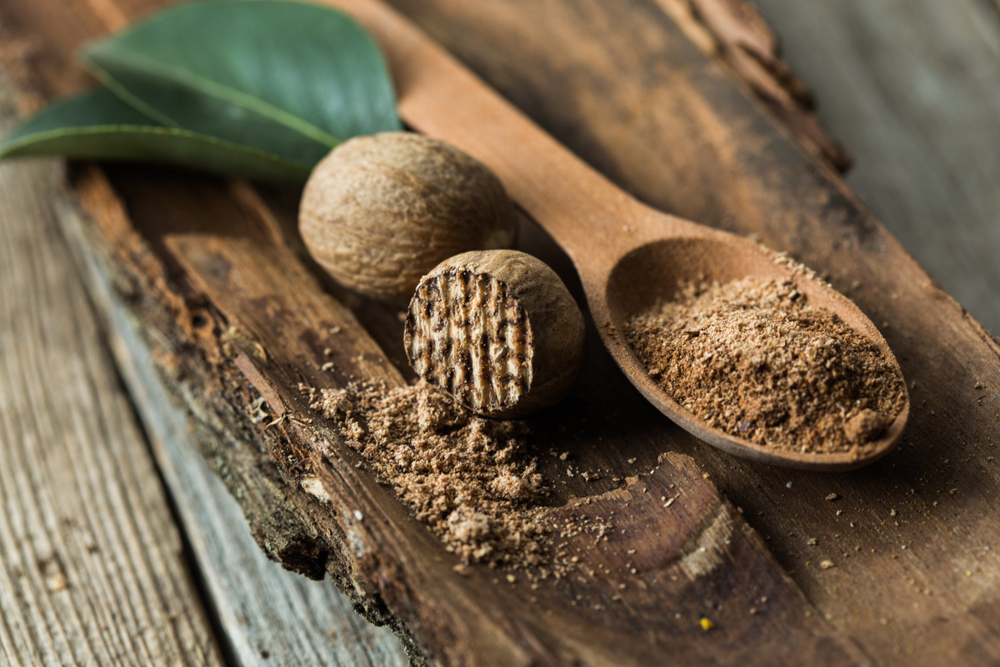 nutmeg on wooden spoon
