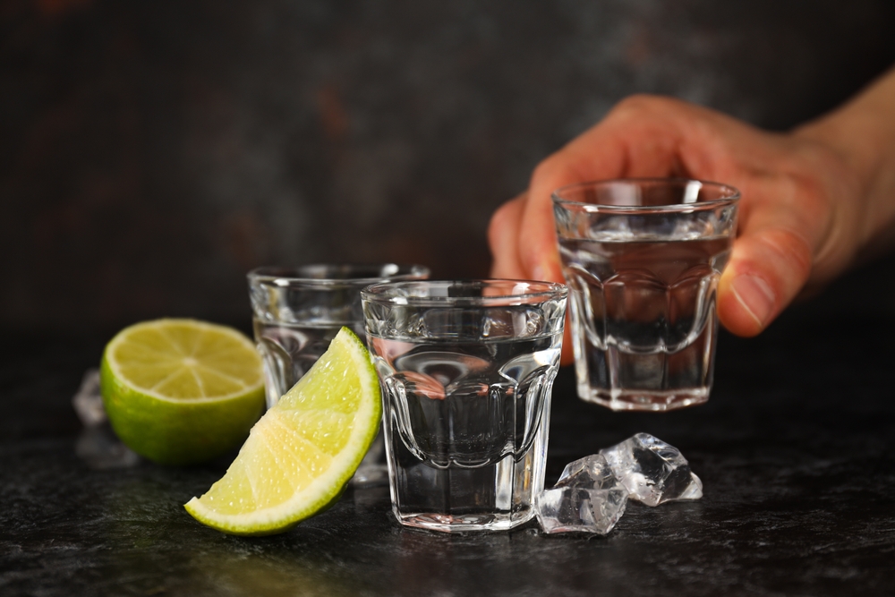 alcoholic drinks in shot glasses