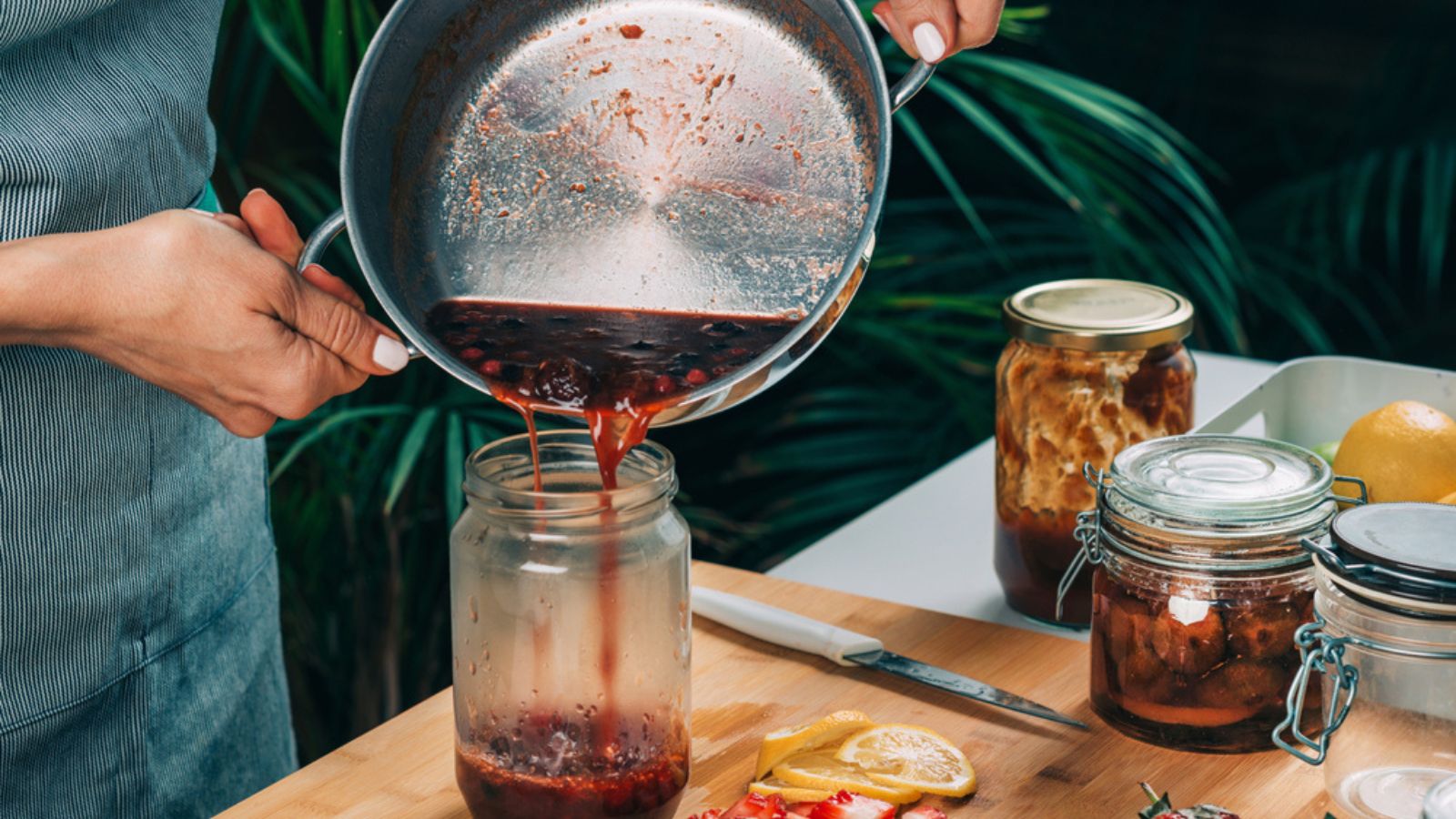 pouring jam in jar