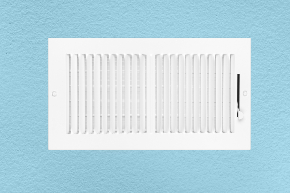 heat register on blue wall