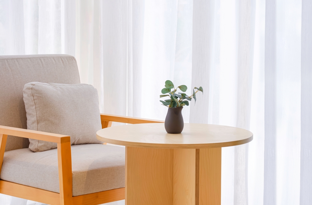 round table next to armchair