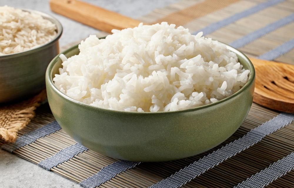 boiled rice in a green bowl