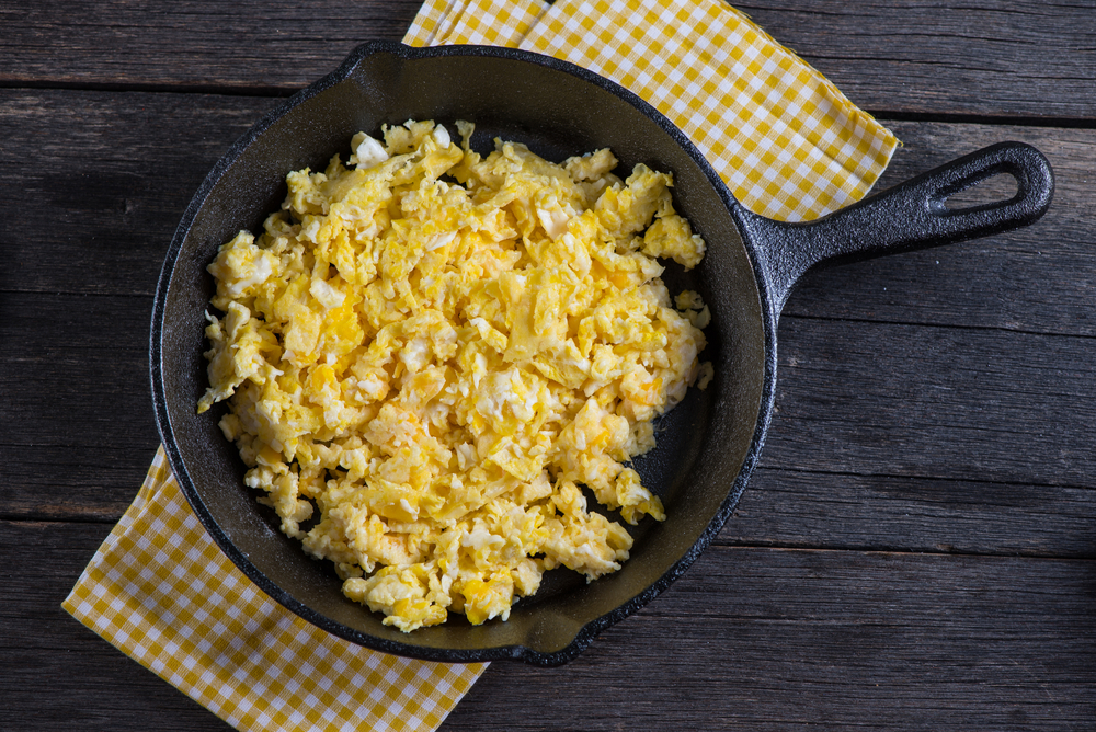 plain scrambled egg in cast iron pan