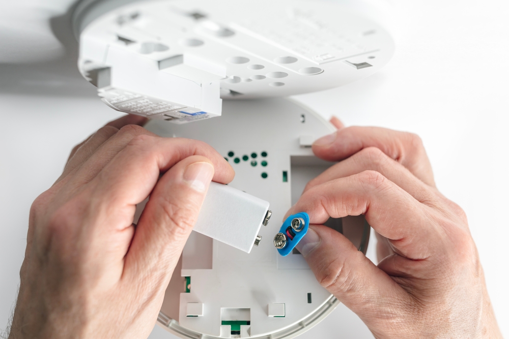 checking home smoke alarms