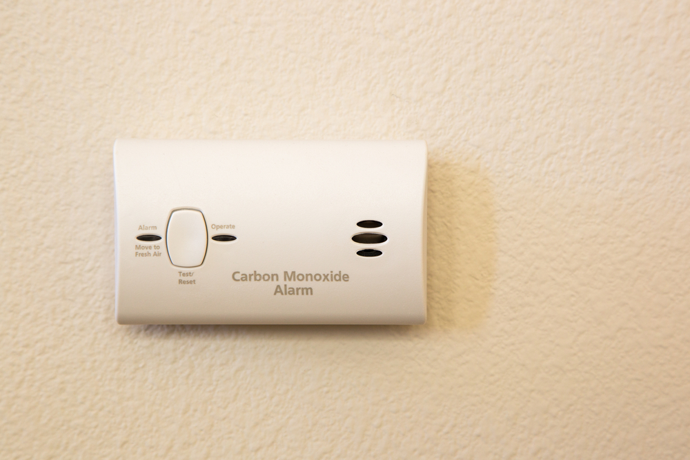 carbon monoxide alarm fixed to wall