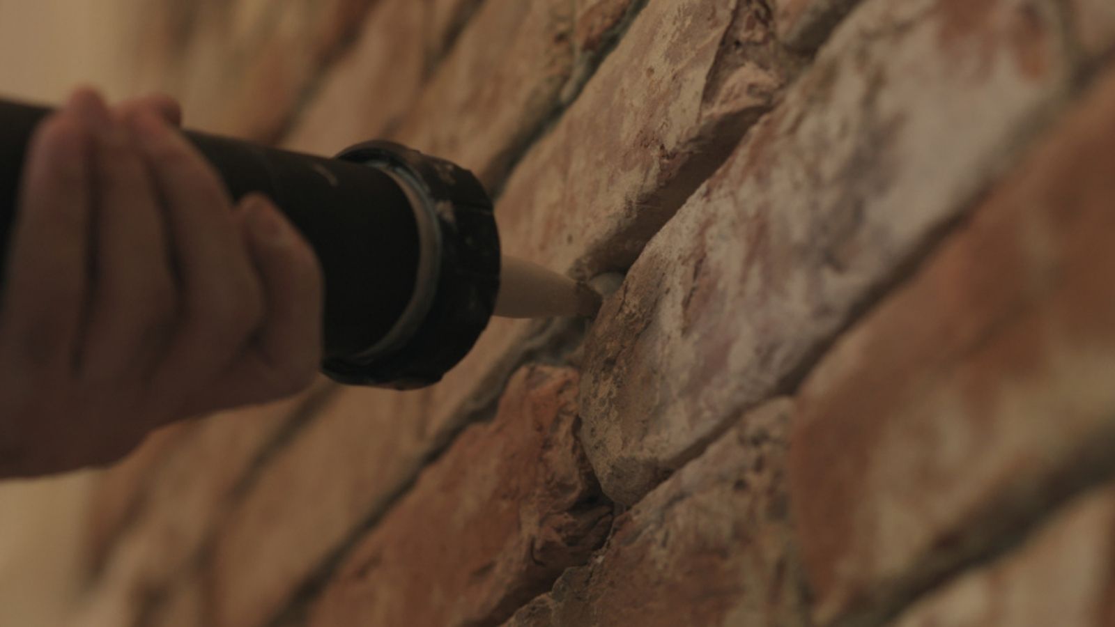 masonry cracks with silicone caulk