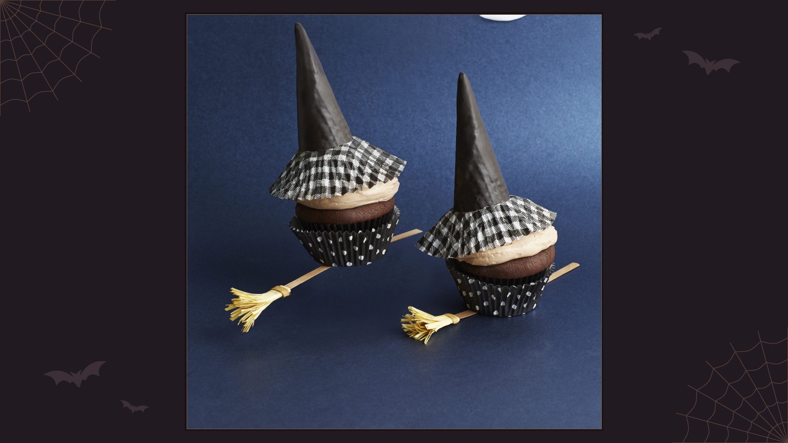 Chocolate pumpkin cupcakes decorated with frosting and chocolate witch hats