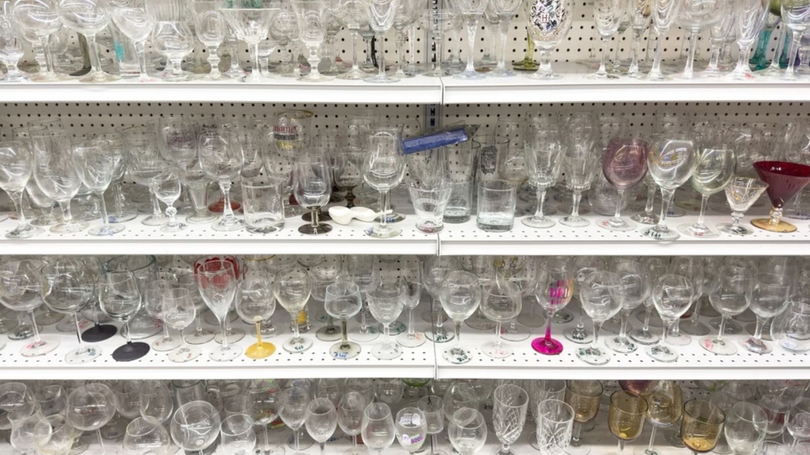 collection of glass in thrift store